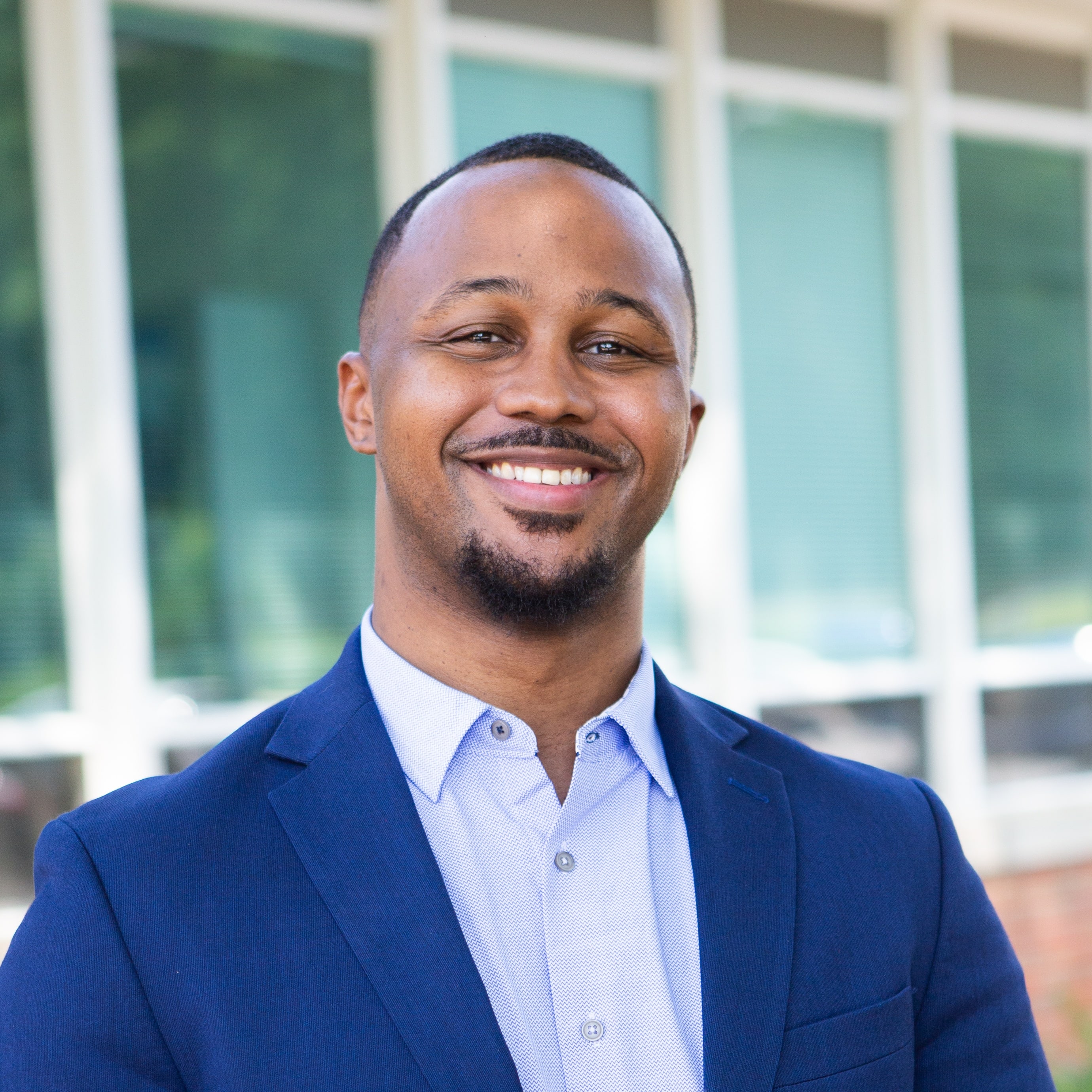 Man in suit smiling