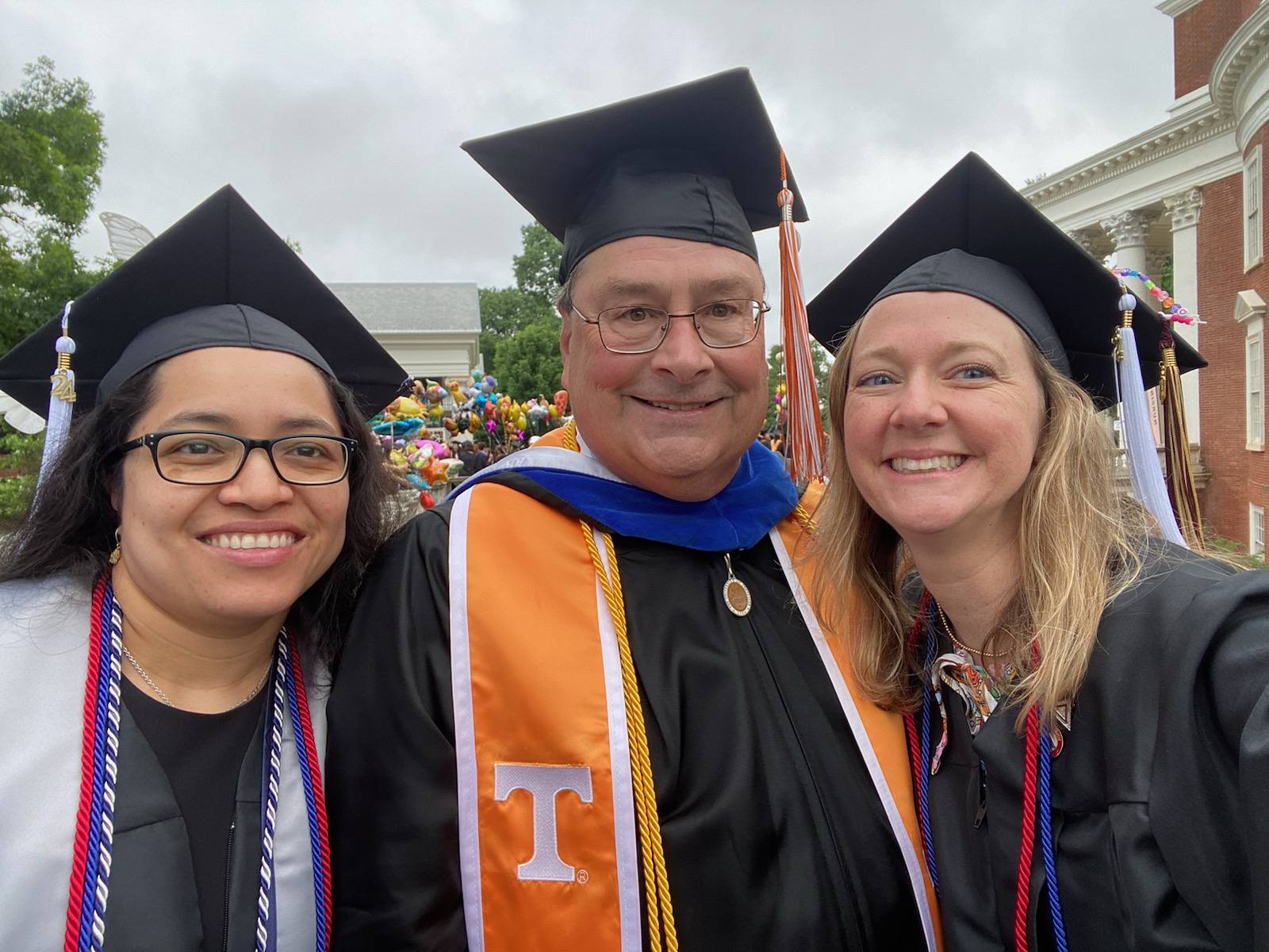 Erath and students at graduation