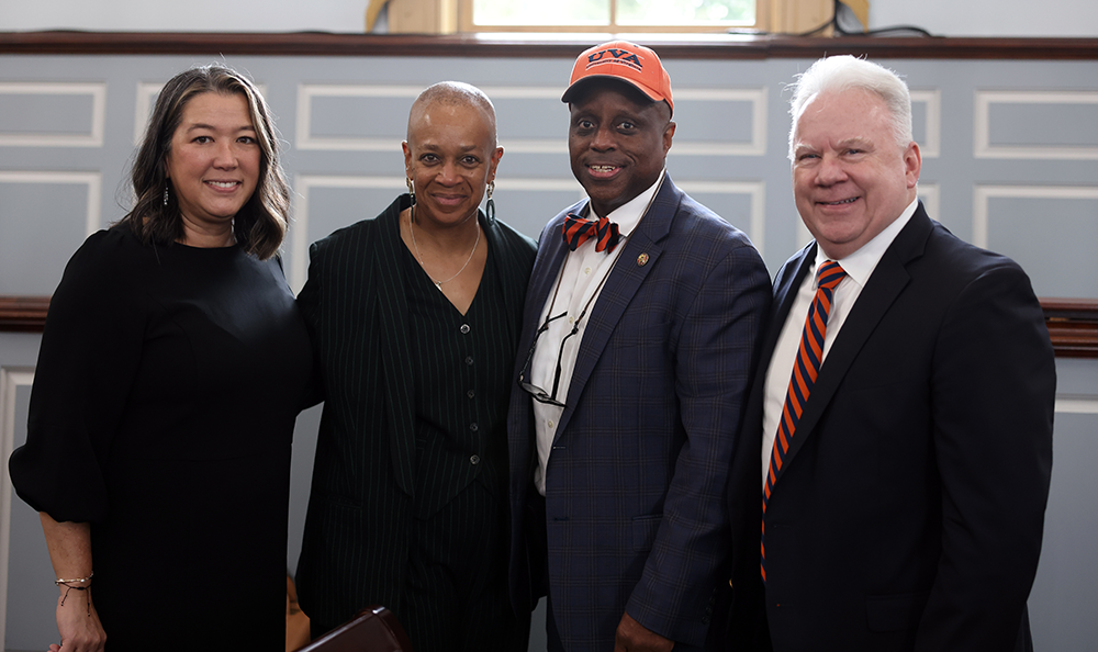 CPSJ Faculty stand together smiling at the Oct 3 Panel Event